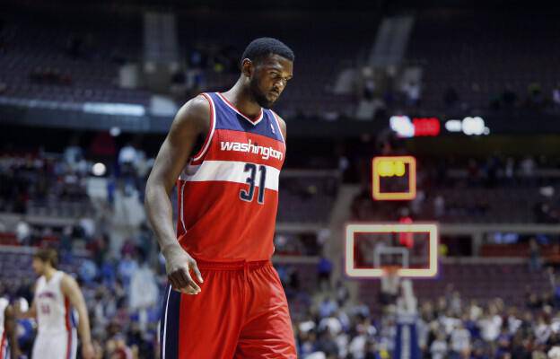 Washington Wizards forward Chris Singleton (31) walks off the court after a 100-68 loss to the Detroit Pistons in an NBA basketball game in Auburn Hills, Mich., Friday, Dec. 21, 2012. (AP Photo/Duane Burleson)