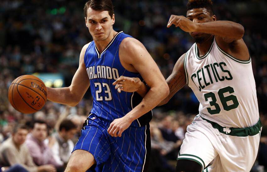 Jan 29, 2016; Boston, MA, USA; Orlando Magic guard Mario Hezonja (23) drives to the hoop against Boston Celtics guard Marcus Smart (36) during the first half at TD Garden. Mandatory Credit: Mark L. Baer-USA TODAY Sports