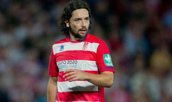 GRANADA, SPAIN - SEPTEMBER 30: Manuel Iturra of Granada CF walks on during the La Liga match between Granada CF and Athletic Club at Estadio Nuevo Los Carmenes on September 30, 2013 in Granada, Spain. (Photo by Gonzalo Arroyo Moreno/Getty Images)