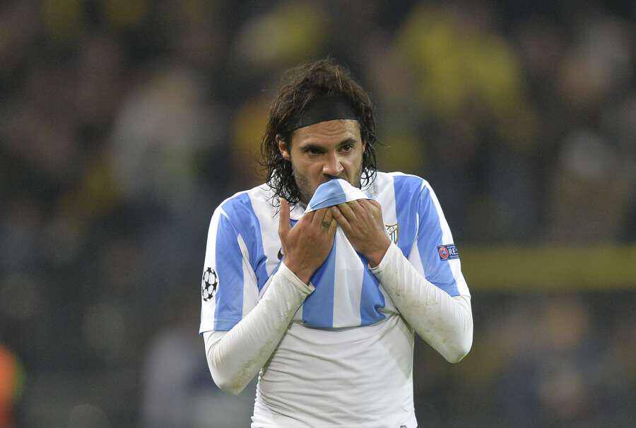 Malaga's Sergio Sanchez reacts at the end of the Champions League quarterfinal second leg soccer match between Borussia Dortmund and Malaga CF in Dortmund, Germany, Tuesday, April 9, 2013. (AP Photo/Martin Meissner)