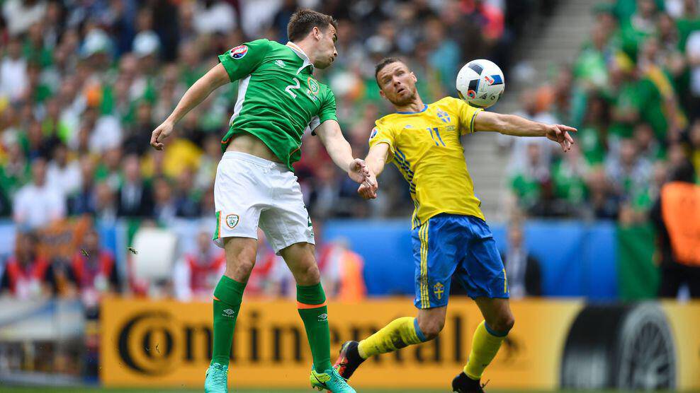 Sweden's forward Marcus Berg (R) and Ireland's defender Seamus Coleman vie for the ball during the Euro 2016 group E football match between Ireland and Sweden at the Stade de France stadium in Saint-Denis on June 13, 2016. / AFP / MARTIN BUREAU (Photo credit should read MARTIN BUREAU/AFP/Getty Images)