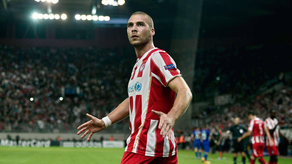 Olympiacos' Swiss midfielder Pajtim Kasami celebrates after scoring a goal during the Group A Champions League football match Olympiacos vs Juventus at the Karaiskaki stadium in Athens' Piraeus district on October 22, 2014. AFP PHOTO / LOUISA GOULIAMAKI (Photo credit should read LOUISA GOULIAMAKI/AFP/Getty Images)