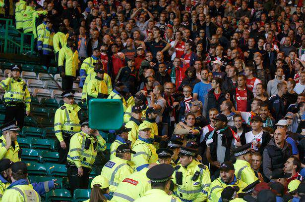 Police-are-forced-to-move-in-after-seats-are-ripped-out-at-Celtic-Park