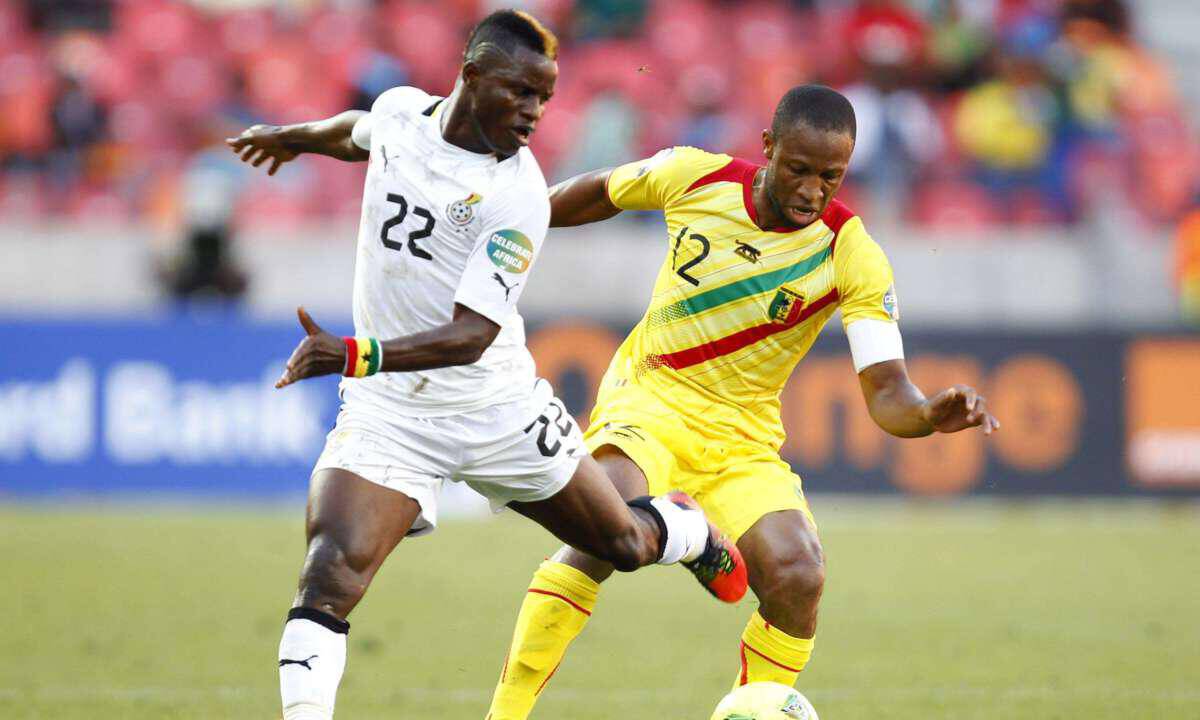 Ghana's Wakaso and Mali's Keita fight for the ball during their African Nations Cup soccer match in Port Elizabeth