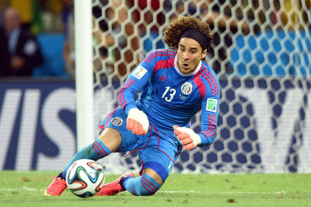 June 17, 2014; Fortazela, BRAZIL; Mexico goalkeeper Guillermo Ochoa makes a save against Brazil during the 2014 World Cup at Estadio Castelao. Mandatory Credit: Tim Groothuis/Witters Sport via USA TODAY Sports ORIG FILE ID: 20140617_jla_ao6_619.jpg