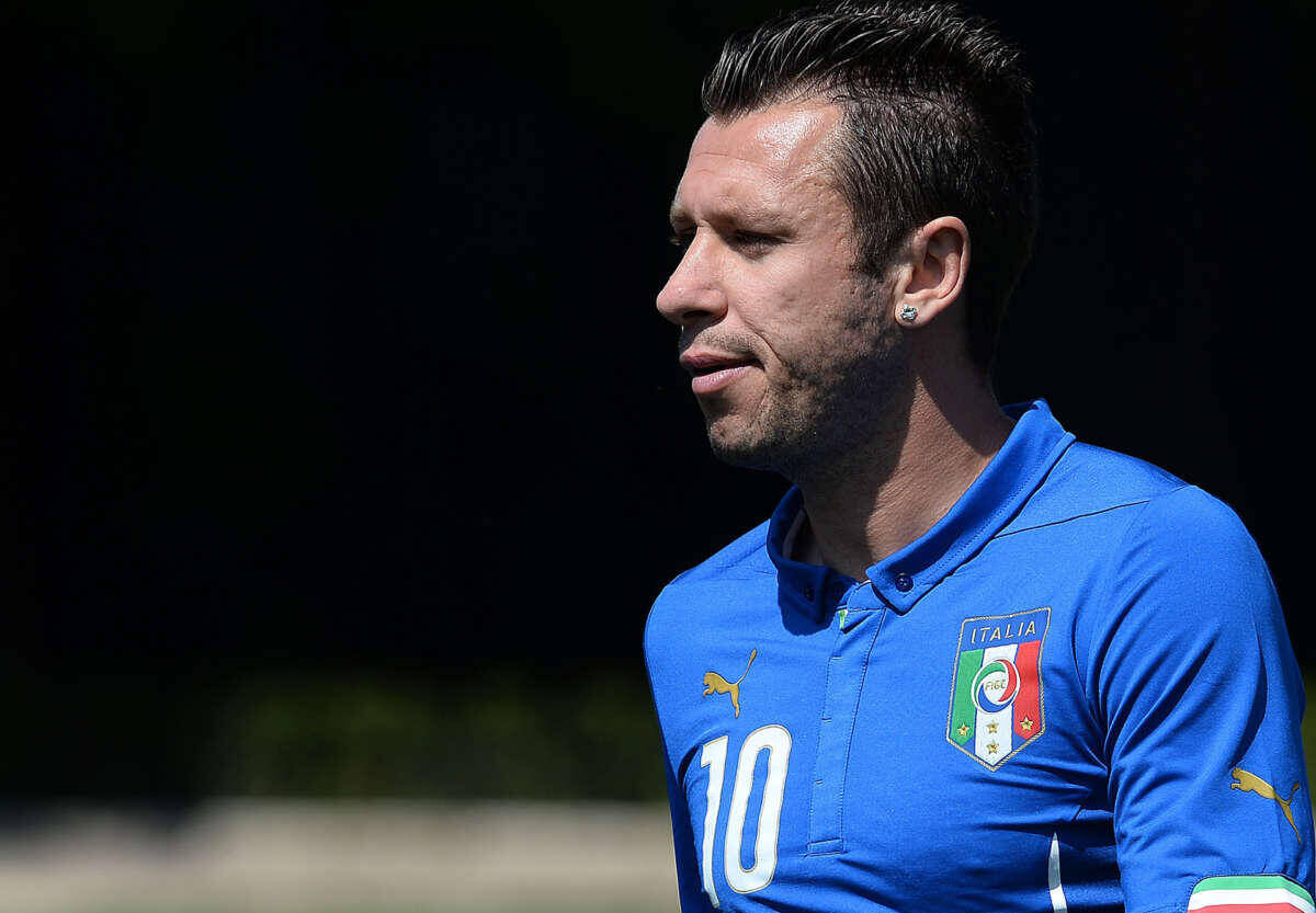 Italy's national football team forward Antonio Cassano arrives on the pitch to take a team picture at Florence's Coverciano training ground on June 3, 2014, before their last friendly match for the upcoming FIFA World Cup Brazil 2014. AFP PHOTO / Filippo MONTEFORTE (Photo credit should read FILIPPO MONTEFORTE/AFP/Getty Images)