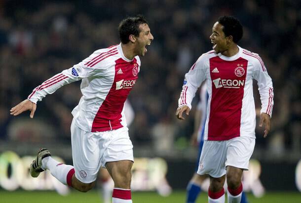 Mounir El Hamdaoui Mounir El Hamdaoui (L) cheers with teammate Urby Emanuelson (R) after scoring the first goal for Ajax in the premier league football match against Heerenveen in Amstredam on October 27, 2010. AFP PHOTO / ANP / OLAF KRAAK -netherlands out - belgium out- (Photo credit should read OLAF KRAAK/AFP/Getty Images)